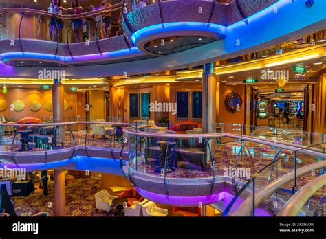 The multi floor atrium on board the Royal Caribbean cruise ship Serenade of the Seas Stock Photo ...