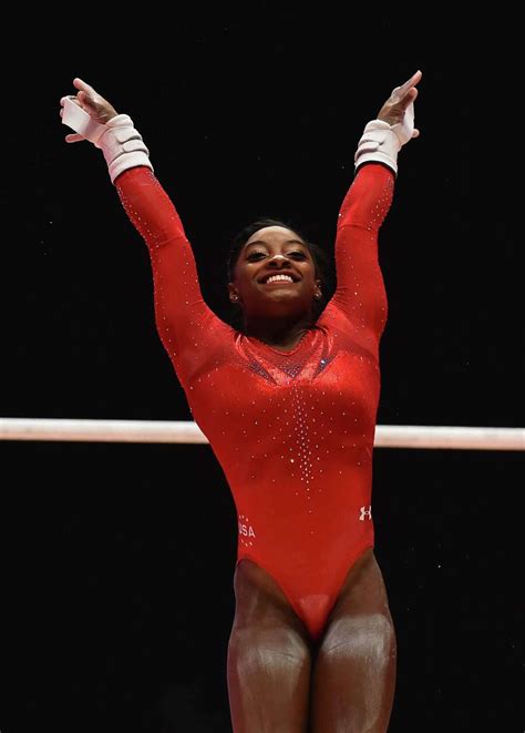 Spring's Simone Biles wins third straight world all-around gymnastics title