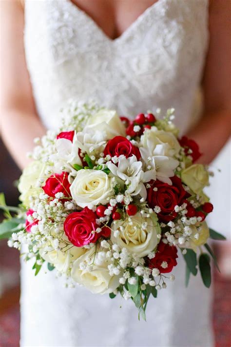 white and red bridal bouquet of beautiful roses , baby's breath and freesias @chateaulagorce www ...