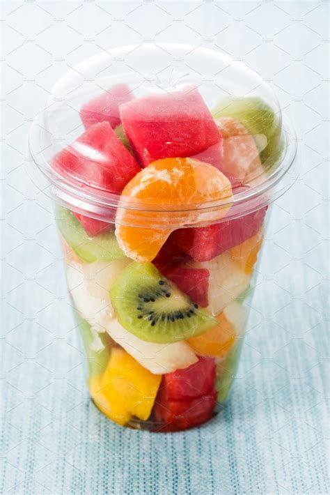 Fresh cut fruit in a plastic cup featuring alcohol, beverage, and blue | Food Images ~ Creative ...