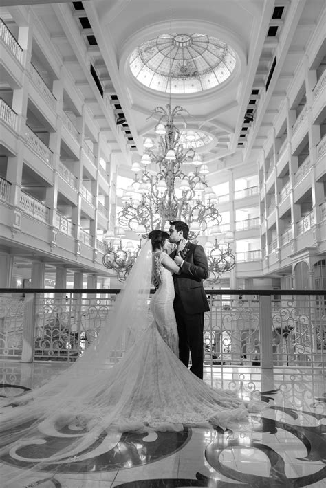 The Grand Floridian Lobby makes the most beautiful backdrop for wedding day portraits. Photo ...