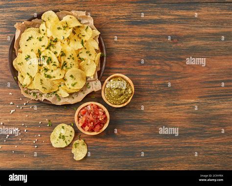 Potato chips with dipping sauces Stock Photo - Alamy