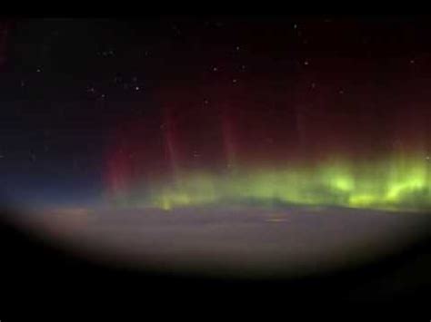 Aurora Borealis Time-Lapse Video Captured Through Passenger Window During a Transatlantic Flight