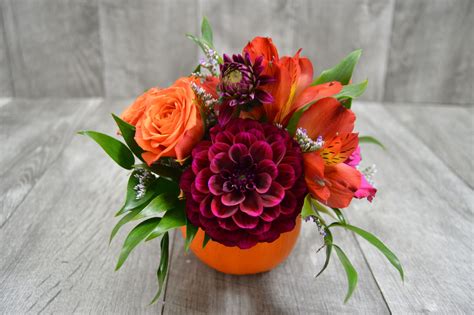 In honor of today being October 1st! Here is a cute pumpkin arrangement ...