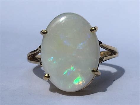 Vintage Opal Ring. 4+ Carat Oval White Opal. 10K Yellow Gold Setting. Unique Engagement Ring ...