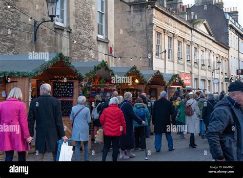 Shoppers and chalets at Bath Christmas Market, UK. 2018 Stock Photo - Alamy