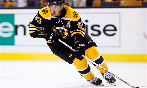 Boston Bruins’ Brad Marchand suffers concussion after taking an elbow ...