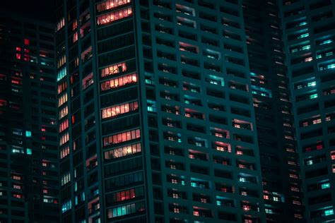 A very tall building lit up at night photo – Free Japan Image on Unsplash