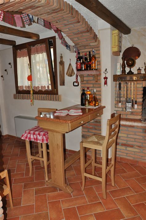 Cucina con penisola in legno | Fadini Mobili Cerea Verona