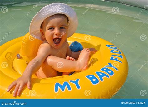 Baby boy float editorial image. Image of water, summer - 59166850