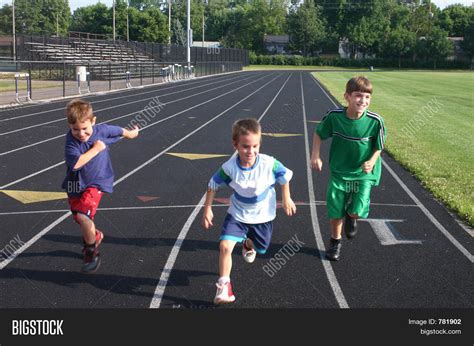 Kids Running On Track Image & Photo (Free Trial) | Bigstock