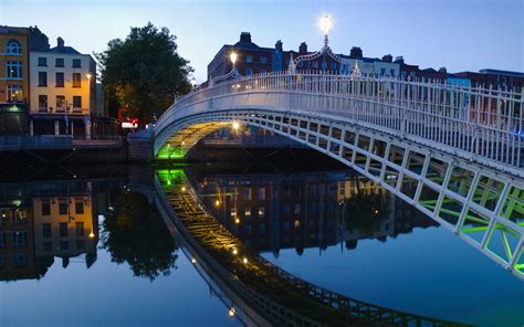 The Ha'penny Bridge over the Liiffy River, Dublin, Ireland - The Irish Rose