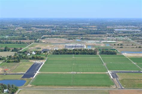 An aerial view of a huge athletic complex being invented and perfected ...