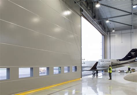 Fabric fold-up hangar doors for aircraft hangars in all size » Champion Door