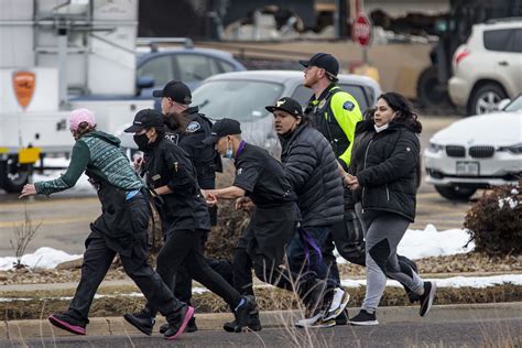 The scene of a shooting at a Boulder, Colo., grocery store. - The ...