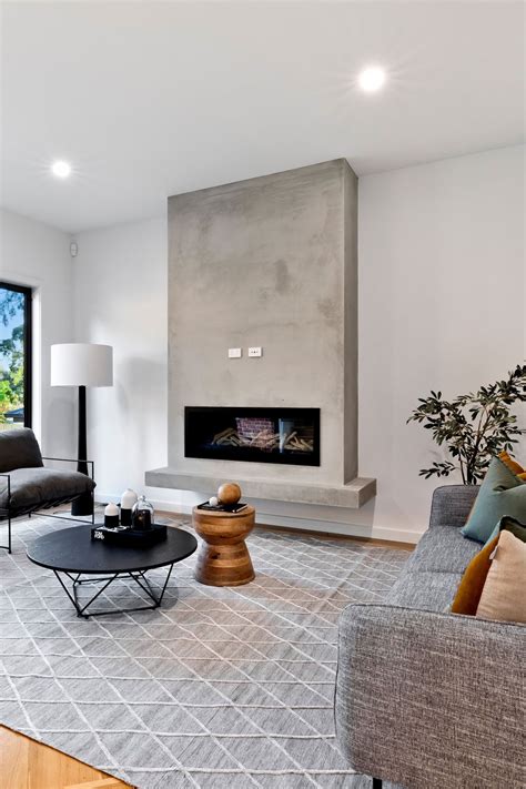 Modern Fireplace with Gray Sofa and Armchairs