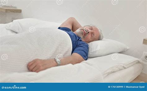 Tired Sleeping Senior Old Man in Bed Stock Image - Image of sleeping, relaxation: 176130999