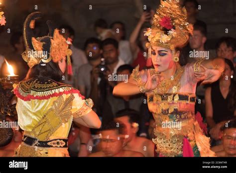 Dramatic photo of colorfully dressed Kecak dancers dressed in ...