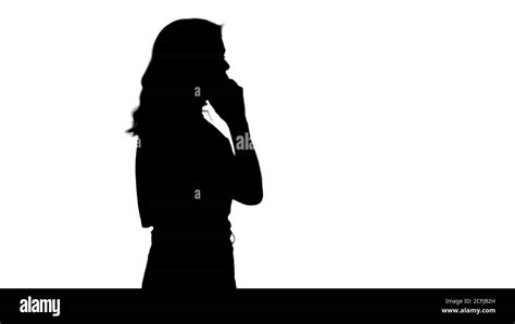 Silhouette Woman talking on the phone Stock Photo - Alamy