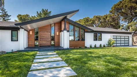 Atomic Ranch on Instagram: “Raise the Roof! 🙌⁠ ⁠ This MCM dwelling blends polished wood ...