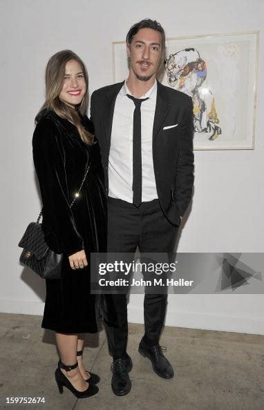 Clothing Designer Erin Chiamulon and actor Eric Balfour attend the ...