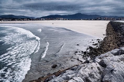 "Hendaye Beach Seen From The Seawall" by Stocksy Contributor "Ivan ...