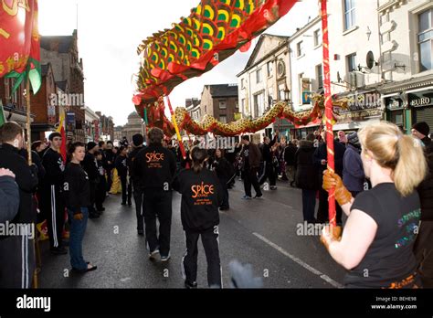 Chinese New Year celebrations in the Chinese quarter of Liverpool featuring a dragon Stock Photo ...