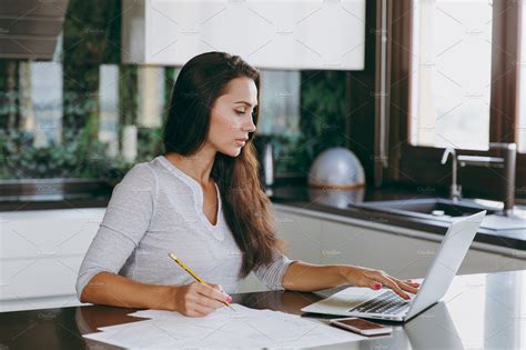 Stylish Businesswoman in Home Office