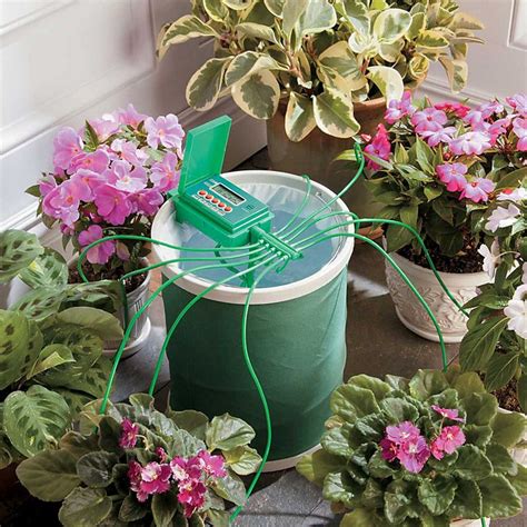 Automatic Plant Watering System waters up to 10 potted plants while you're away. No need to ...