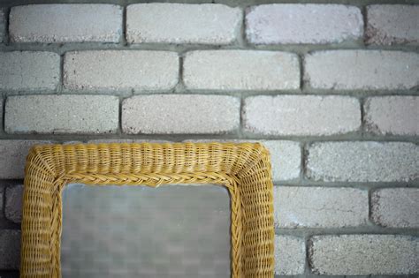 Free Image of Rattan or wicker framed mirror | Freebie.Photography