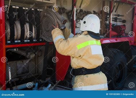 Firefighter in action stock image. Image of firefighter - 159183385