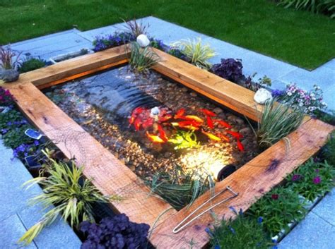 Pond with new oak railway sleepers | Small backyard ponds, Fish ponds backyard, Garden pond design