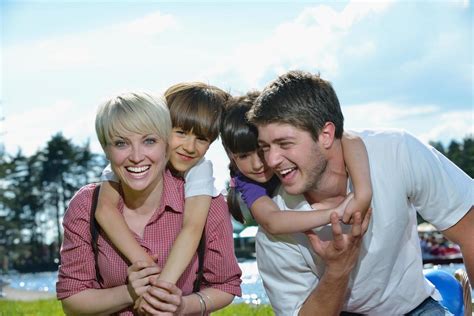 happy young family have fun outdoors 11931077 Stock Photo at Vecteezy