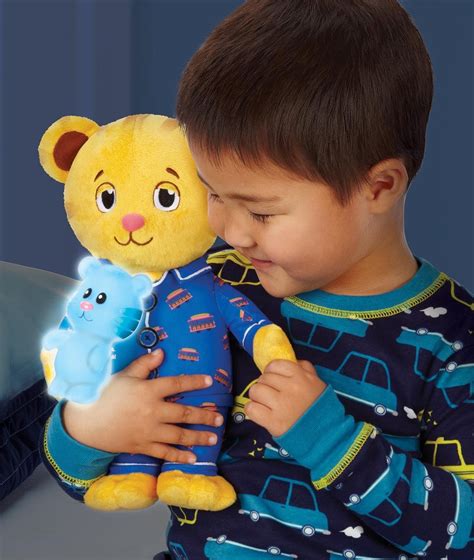 Amazon.com: Daniel Tiger's Neighborhood 94522 Daniel Tiger Snuggle & Glow Plush: Toys & Games