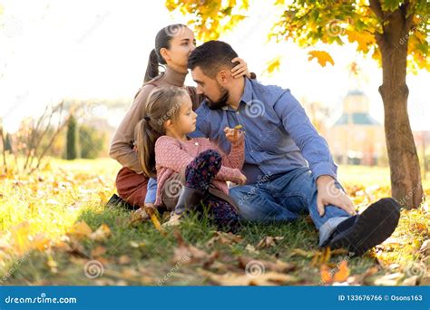 Happy Family at Sunset Walking in the Park in Autumn Stock Photo - Image of outside, daughter ...