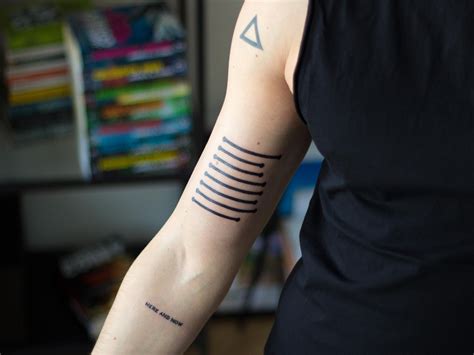 I had an Amos-inspired tattoo made on my arm. It is a coded representation of our solar system ...