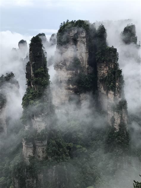 The floating mountains of Zhangjiajie in China. [1536x2048][OC] : r ...