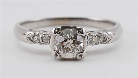Lot - 14KT WHITE GOLD AND DIAMOND SOLITAIRE Approx. 1.95 total dwt.