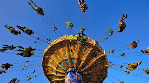 Amusement ride at Oktoberfest in Munich, Germany (© Wolfilser ...