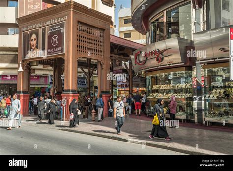 A street entrance to the gold markets of the old town souk of Dubai ...