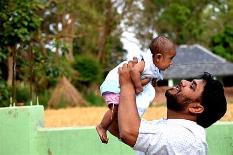 Online crop | HD wallpaper: A man helping teach his 1 year old how to walk., first steps ...