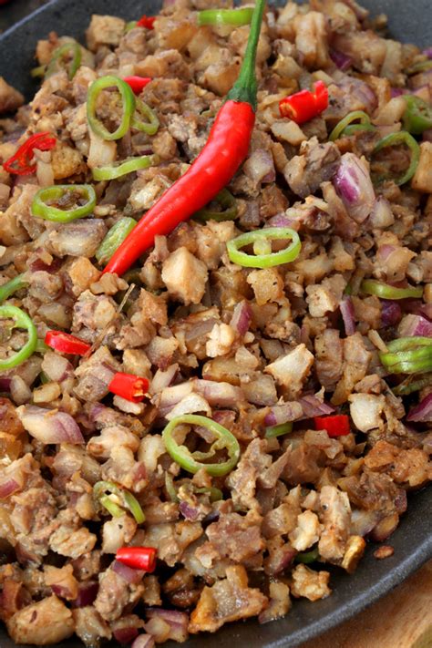 Authentic Kapampangan Sisig recipe using pork belly - Foxy Folksy