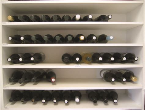 CS006: Figure 2.1 | Part of my wine rack—white wines on top,… | Flickr