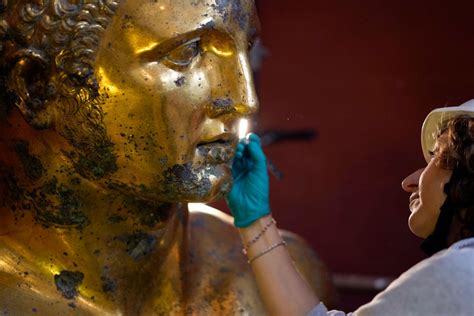 Vatican experts uncovering gilded glory of Hercules statue struck by lightning