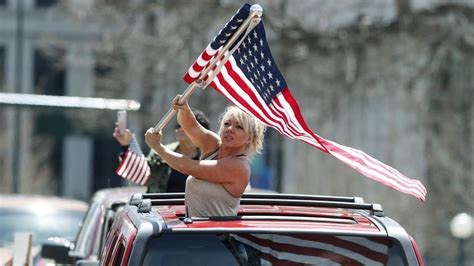 Coronavirus: Powerful photos sum up US COVID-19 protests | The Advertiser