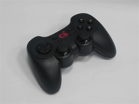 Logitech Cordless Rumblepad 2 - Gamepad mit Playstation-Layout