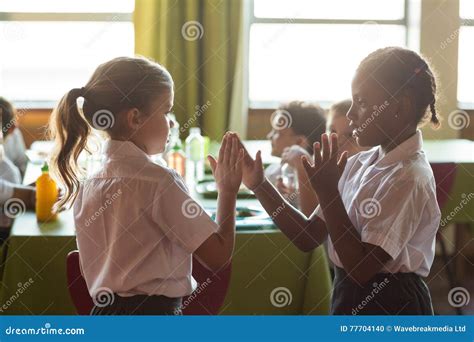 Girls Playing Clapping Game Stock Photo - Image of education, motion: 77704140