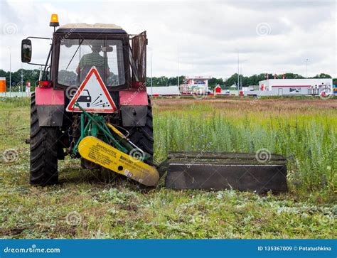 Tractor Mowing Grass at the Curb Editorial Stock Image - Image of ...