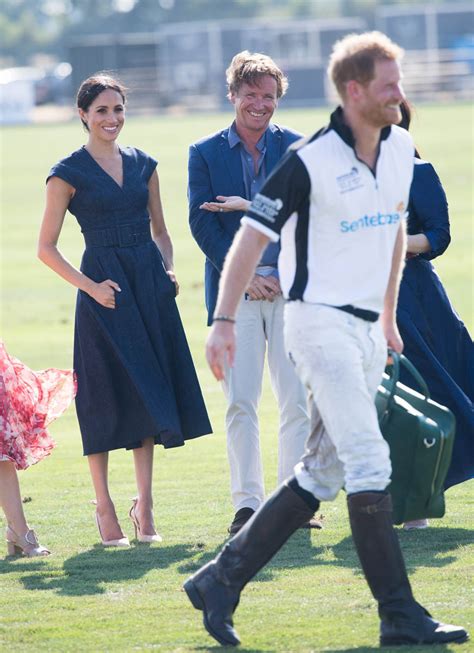 Prince Harry and Meghan Markle kiss at Prince Harry's polo match