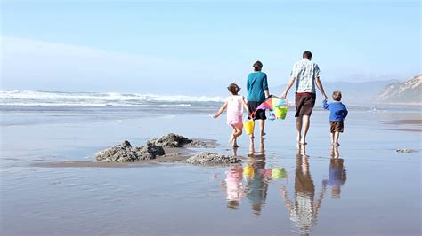 Family Walking At Beach Stock Footage SBV-348368194 - Storyblocks